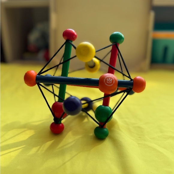 🌈 Manhattan Toy Company Skwish Classic Wooden Rattle & Teether Baby Toy - Picture 1 of 4